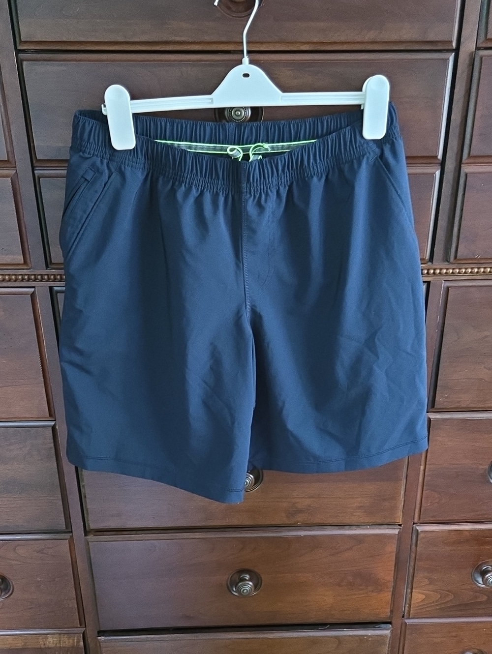 Men's Kirkland Navy Swim Shorts with Neon Green Trim. Like new!